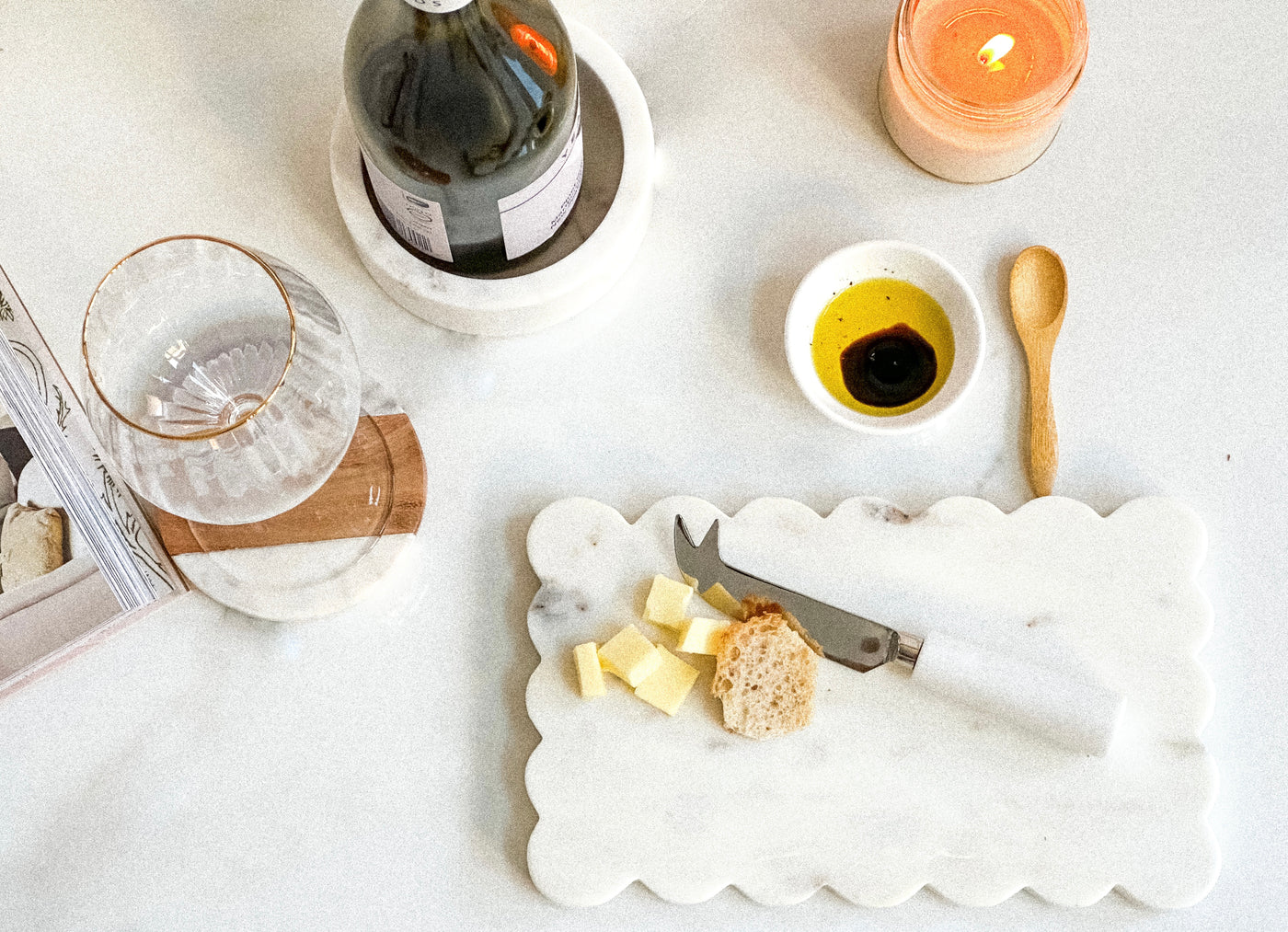  Discover a range of thoughtful items including throw blankets, cutting boards, wine glasses, entertaining essentials, candles, and more - all designed to bring joy and comfort to your space.