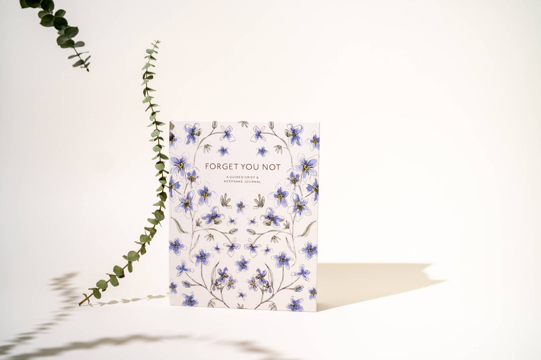 Guided journal with floral design and &