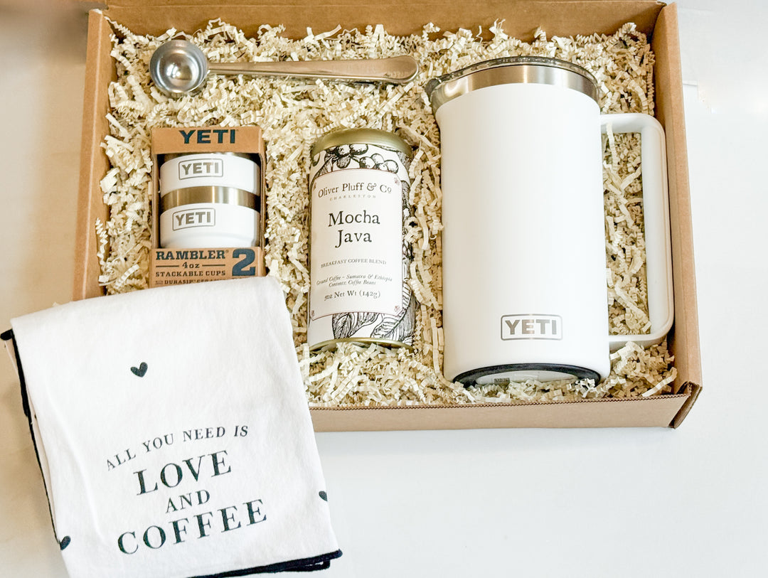 Gift set with YETI press, coffee, tumblers, a scoop and a towel in a box
