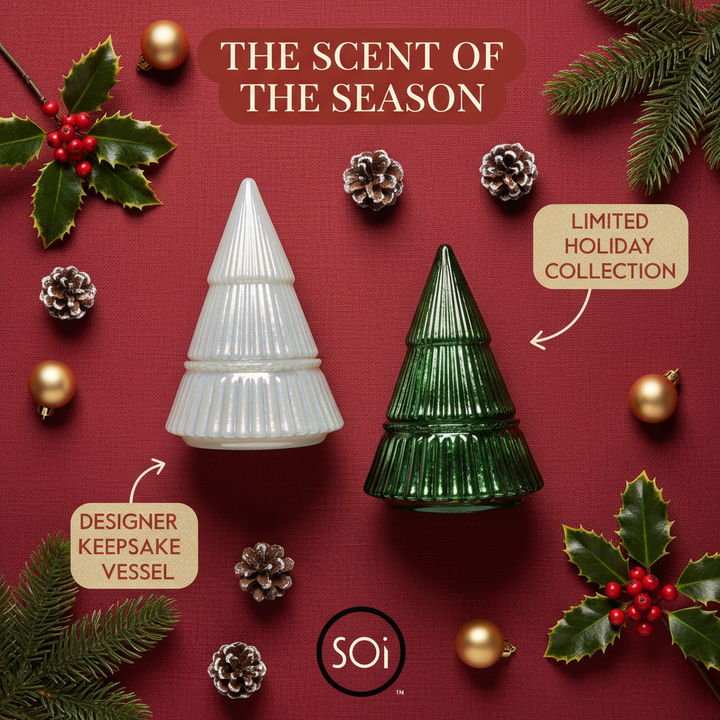 Two Christmas tree-shaped candles on a red background with festive elements and &