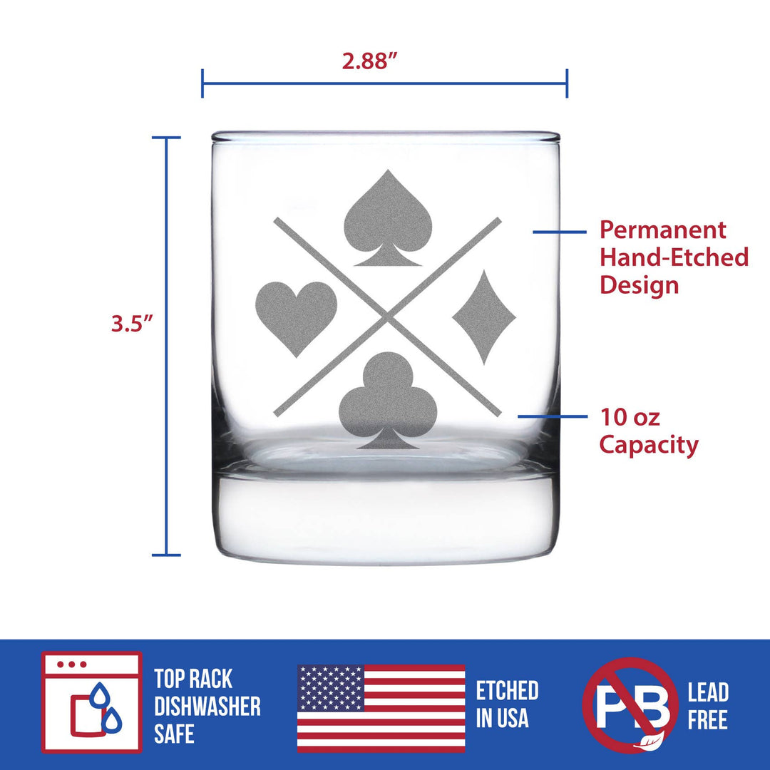 Clear whiskey rocks glass with card suit symbols and measurements on a white background