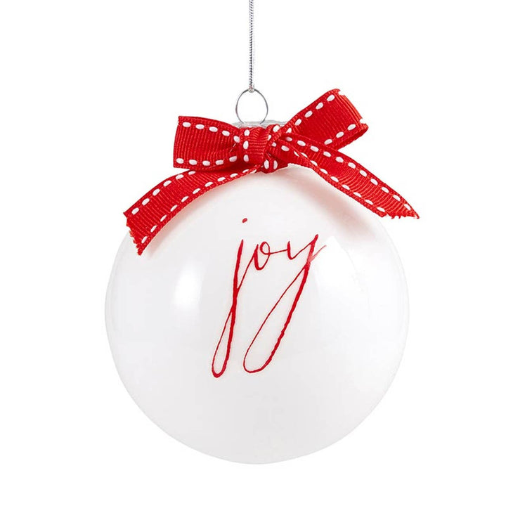 White ornament with red &