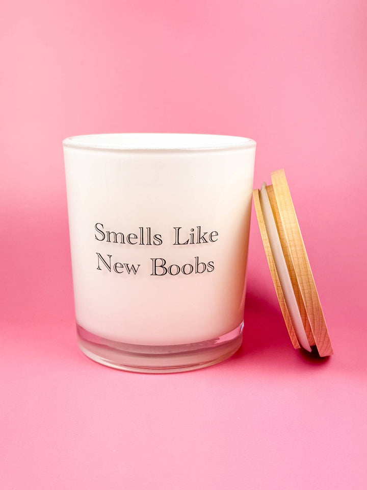 The printed design provides any home with a beautiful decor item while filling the room with a beautiful fragrance!

Printed directly onto the milky-white glass vessel to give a crisp, clean look to each candle.

&amp;nbsp;100% Pure Soy Wax | Premium Fragrance Oils | Lead-free cotton wick | 11.5 oz. | 75-80 hrs burn time | Includes wood lid | 3.5” W x 4” H