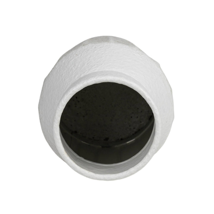 White, round vase on a white background