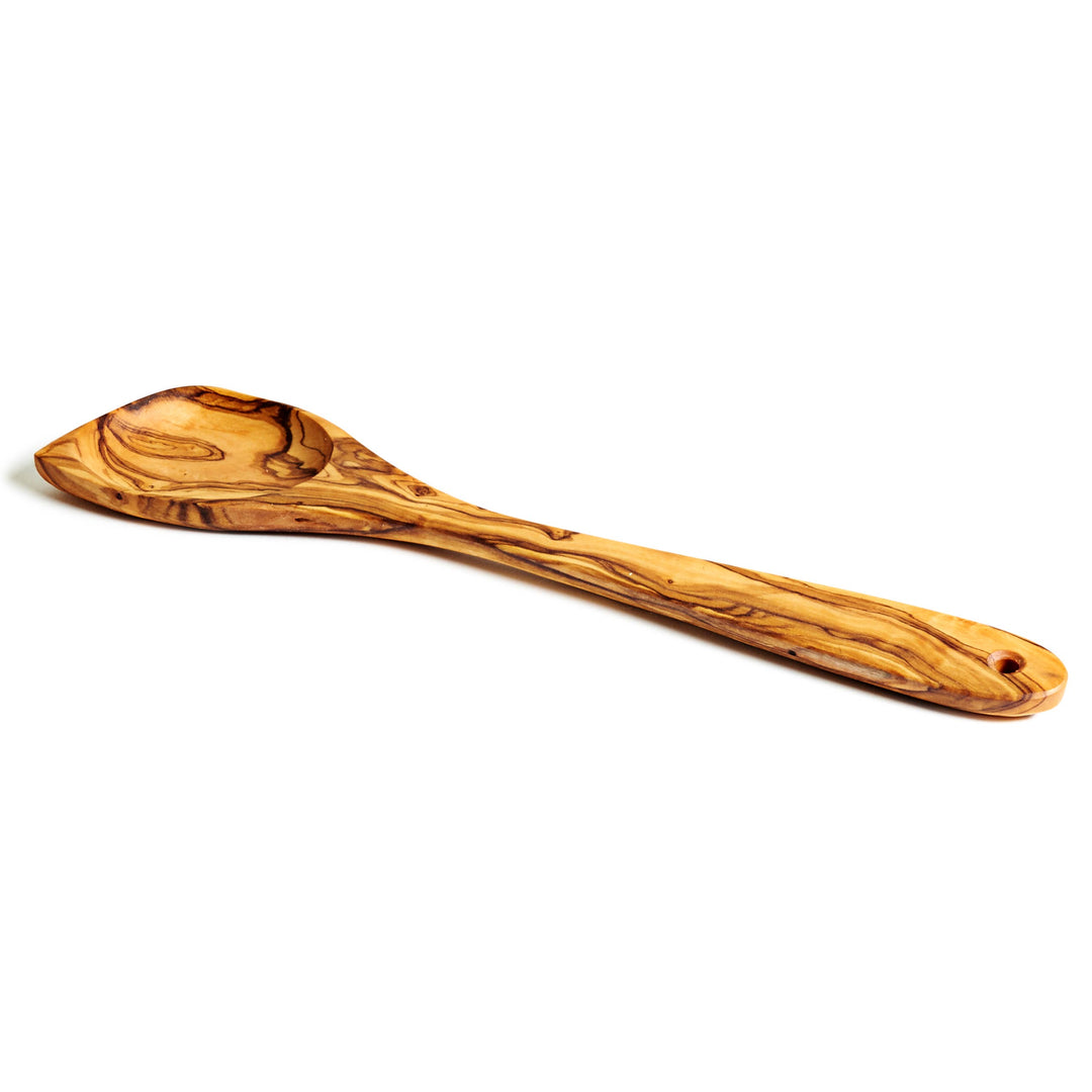 Wooden spoon with a natural finish on a white background