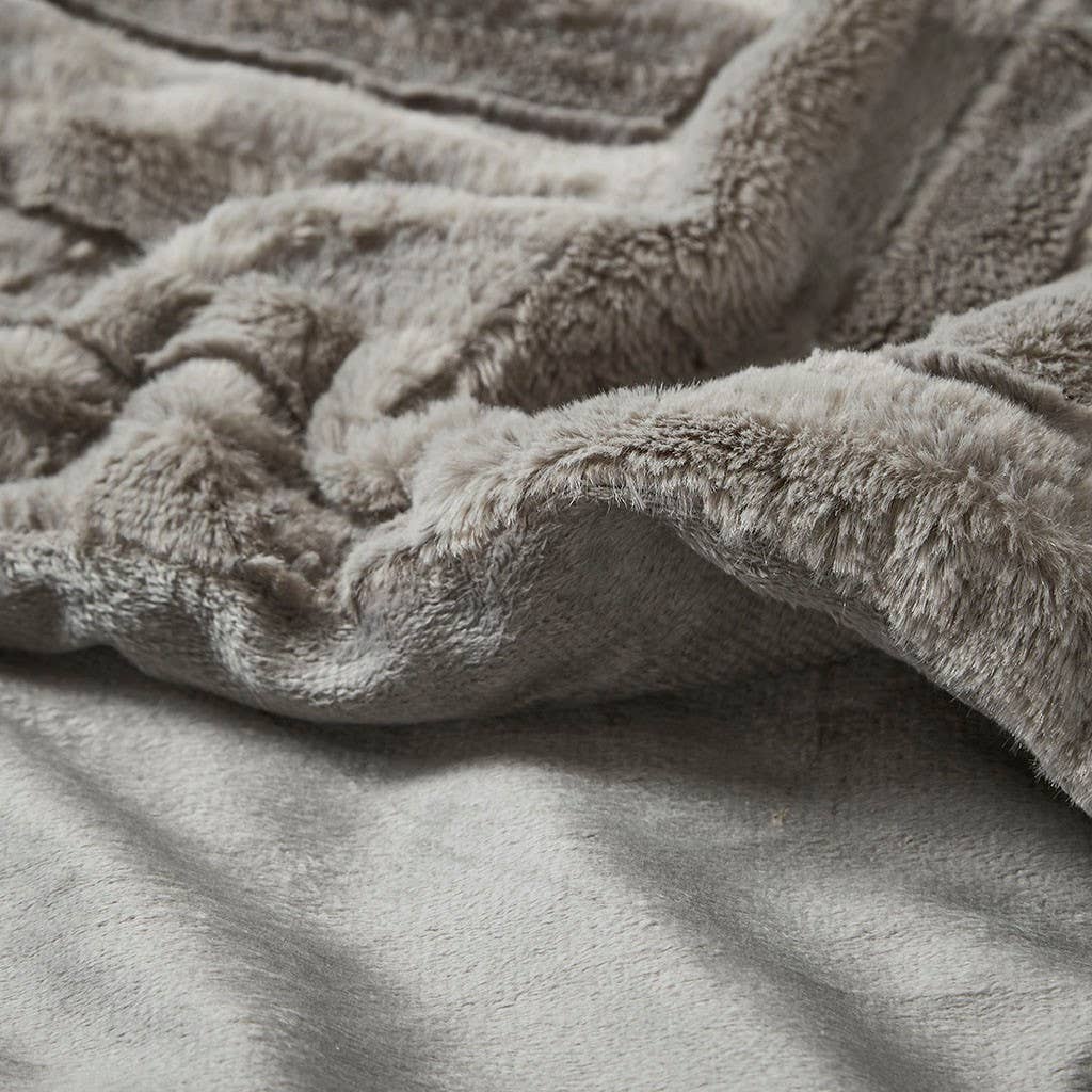 Close-up of a textured gray blanket