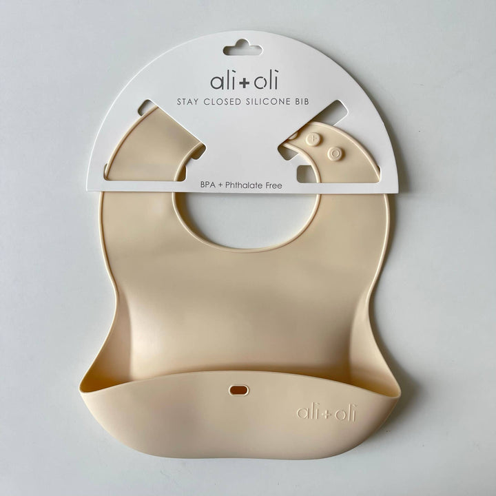 Silicone Baby Bib Roll Up &amp; Stay Closed - (Sand)