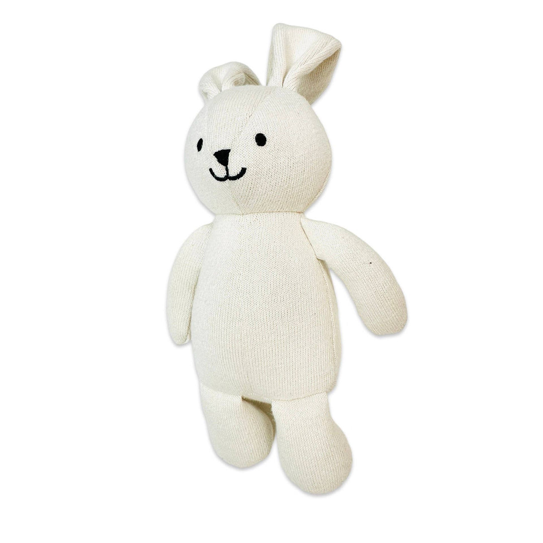 White plush toy with bunny ears on a white background