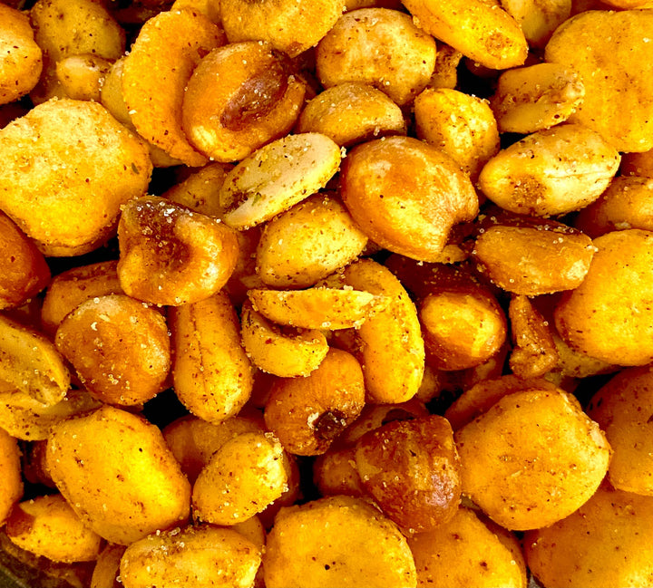 Close-up of Couch Mix with a seasoning on a dark background