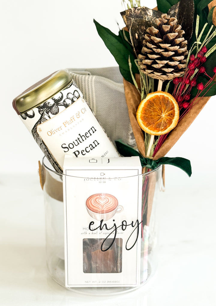 Glass container with coffee labeled &