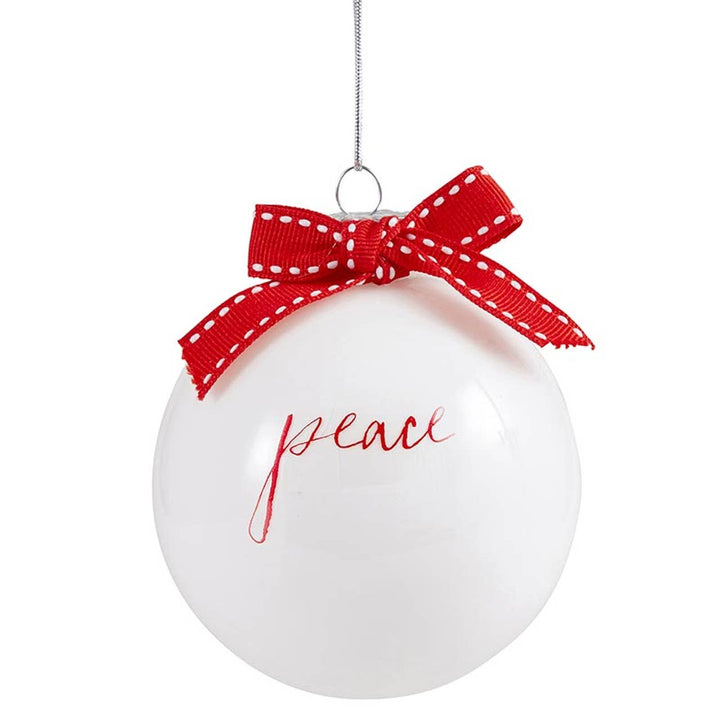 White ornament with red &