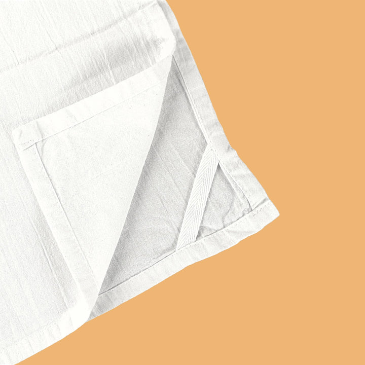 White towel fabric on an orange background