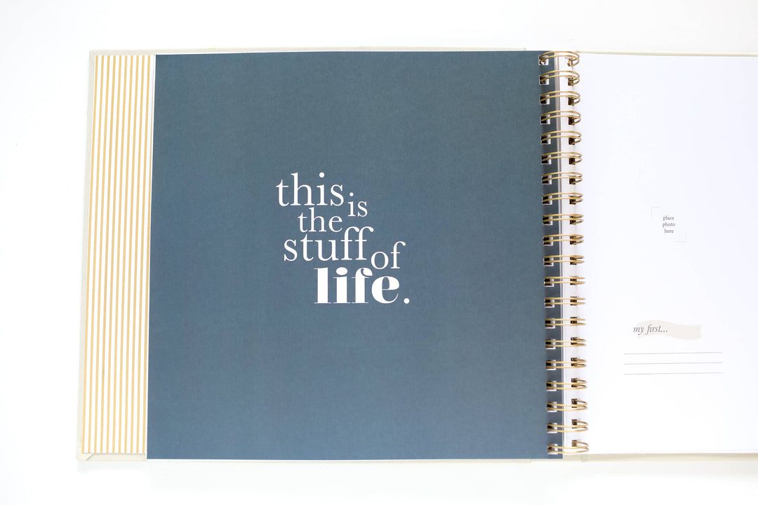 Open notebook with a blue cover and white text on a white background
