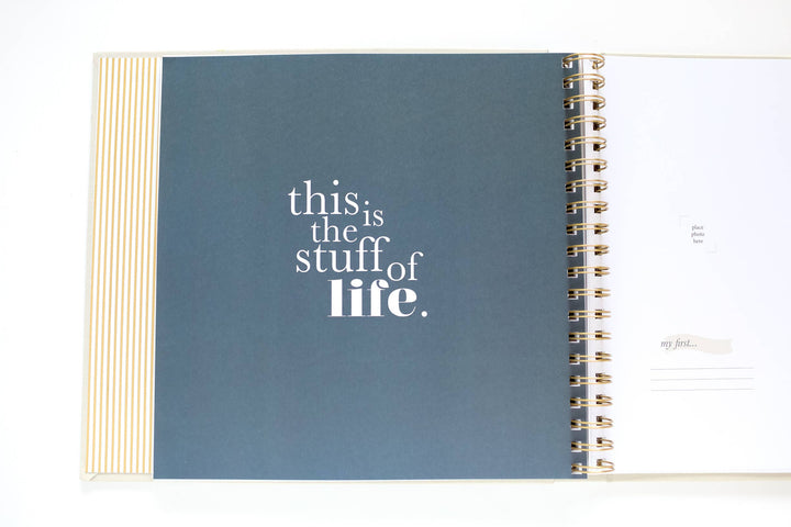 Open notebook with a blue cover and white text on a white background