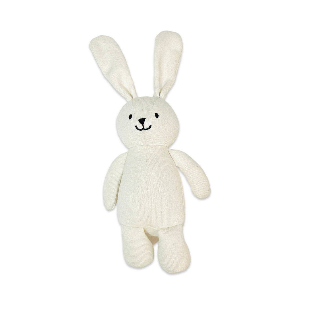 White plush bunny toy on a white background