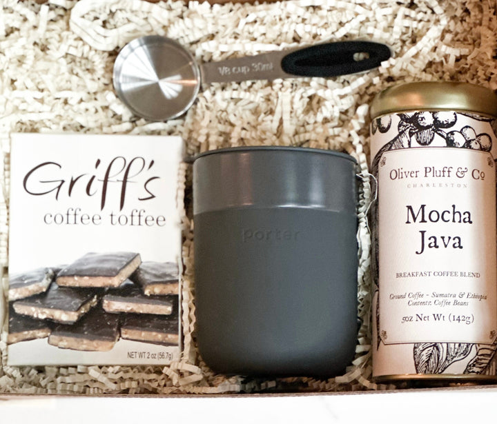 Keywords : Curated gift boxes Charlotte NC, Coffee lover’s gift set, Coffee gift box, Oliver Pluff &amp; Co. Mocha Java, Griff’s coffee toffee Durham, Coffee accessories gift set, Ceramic coffee mug set, Best coffee gift set, Unique coffee gifts Charlotte, Ceramic coffee mug with silicone wrap, Mocha Java breakfast coffee blend, Premium coffee accessories, Local coffee products, Durham coffee toffee