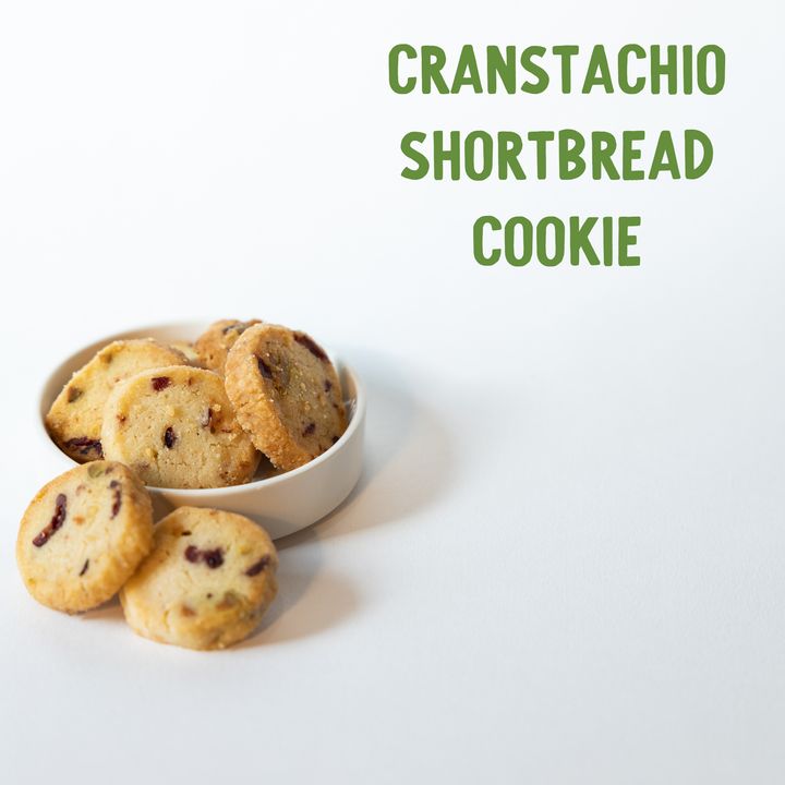 Cranstachio shortbread cookies in a bowl on a white background with green text.