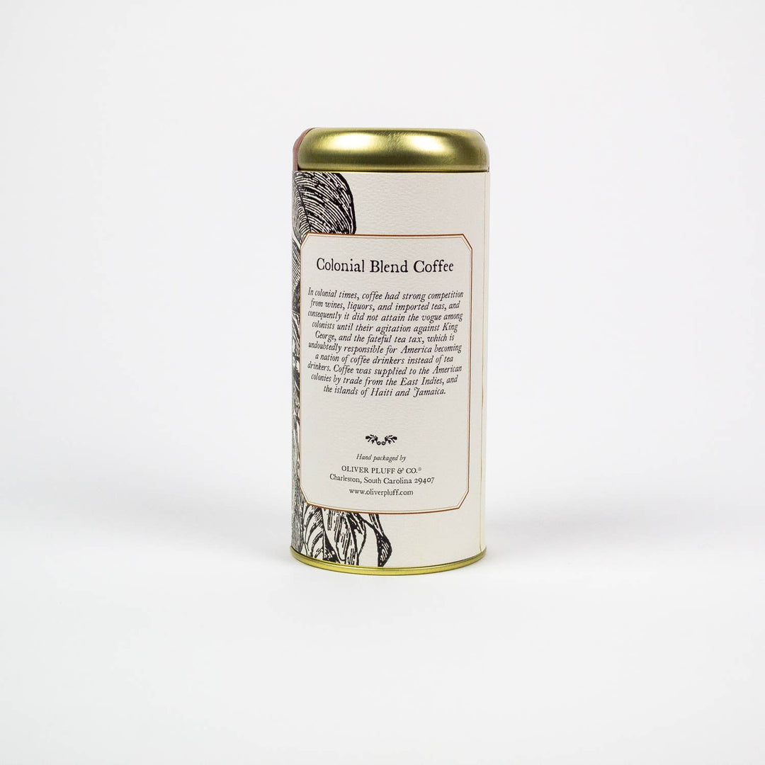 Coffee canister with a gold lid and decorative label on a white background