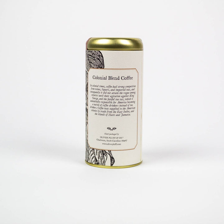 Coffee canister with a gold lid and decorative label on a white background