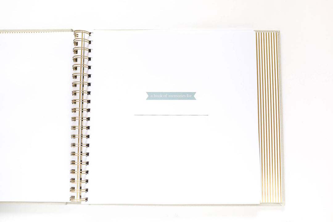 Open spiral-bound notebook with lined pages on a white background