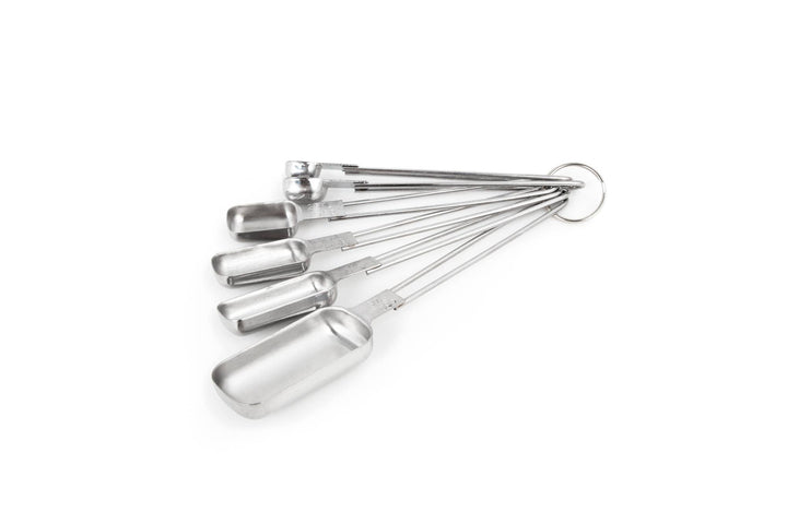 A set of six stainless steel measuring spoons in different sizes, attached together with a ring.
