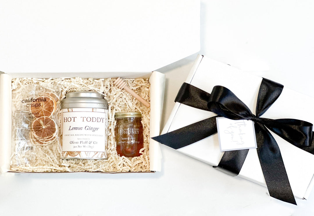 Elevate your cozy moments with our "Hot Toddy & Georgia Honey Kit" featuring Crispy Lemon Slices - a delightful way to indulge in a warm and comforting experience. This curated gift box set combines traditional flavors with a touch of Southern charm, making it a perfect gift for yourself or a loved one.