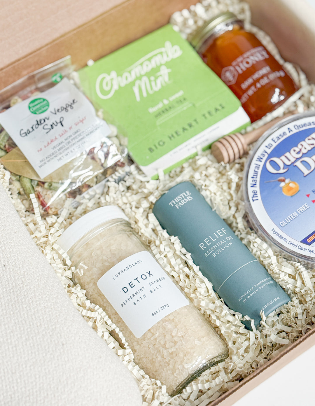 Assorted natural products including a bottle of &
