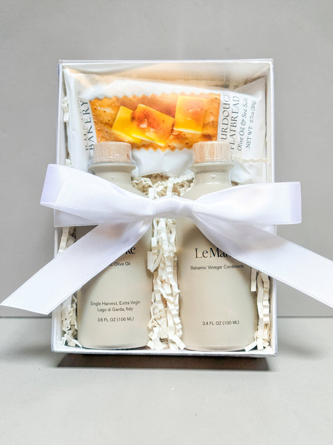 Le Marké olive oil and balsamic vinegar gift set in clear gift box with white ribbon