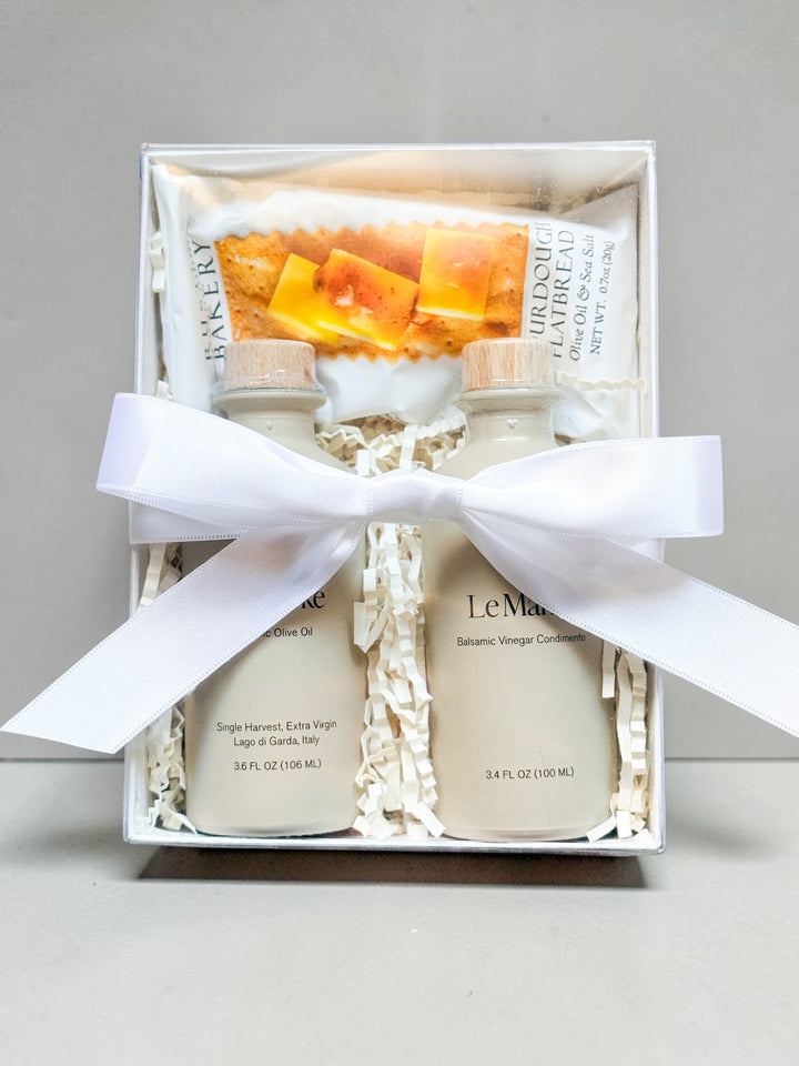 Le Marké olive oil and balsamic vinegar gift set in clear gift box with white ribbon