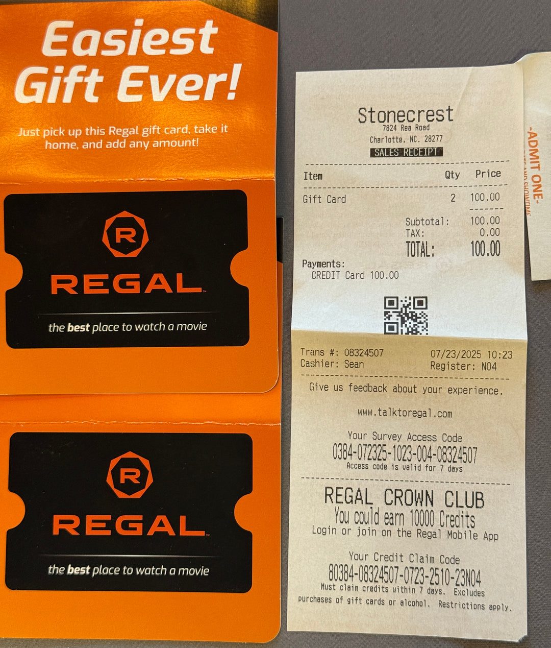 Regal gift card packaging with a receipt on a gray background