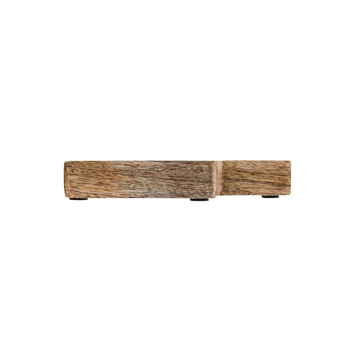 Wooden block with a textured surface on a white background