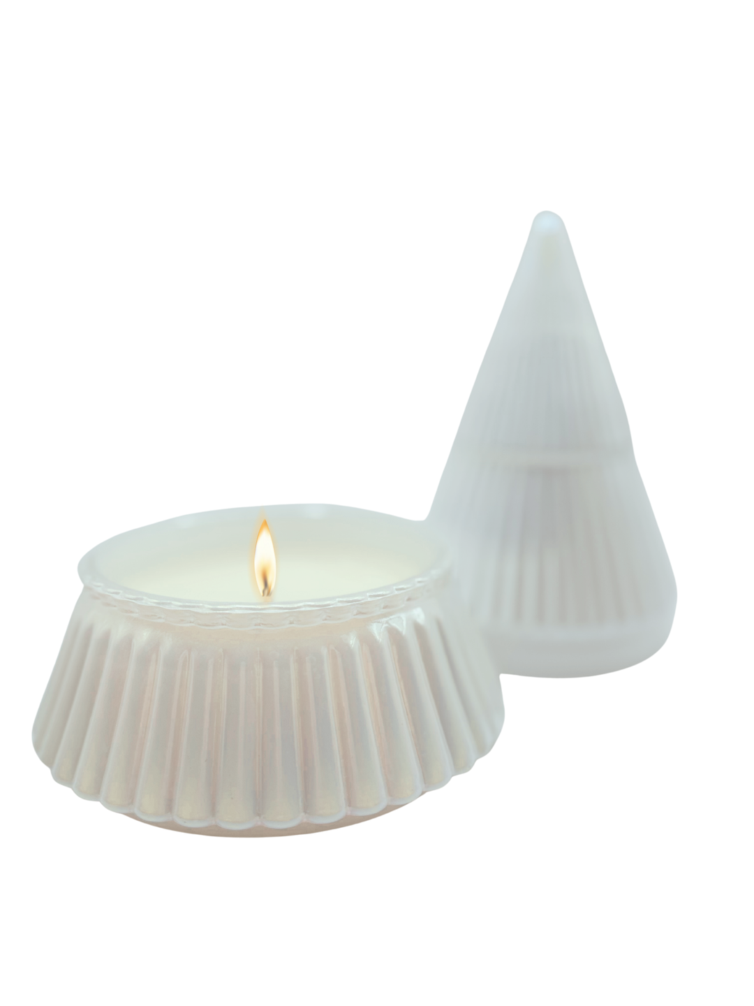 White Christmas tree-shaped candle lit on a white background