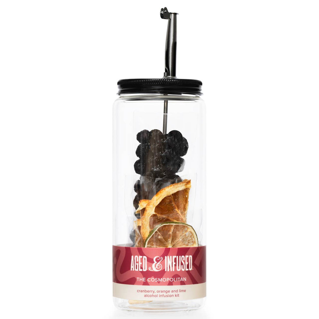 Clear infuser bottle with black lid and fruit pieces on a white background