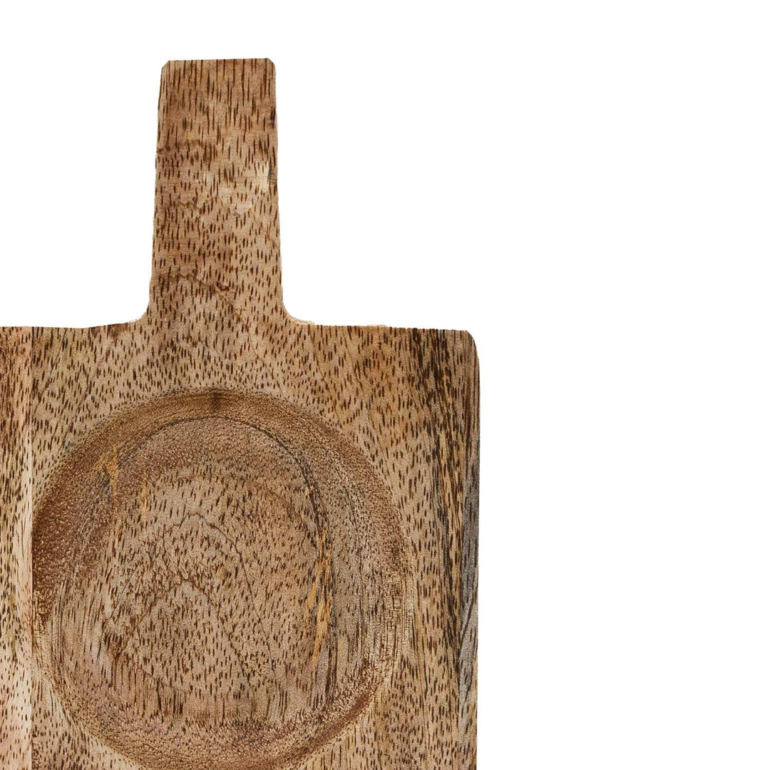 Wooden dish with a handle on a white background