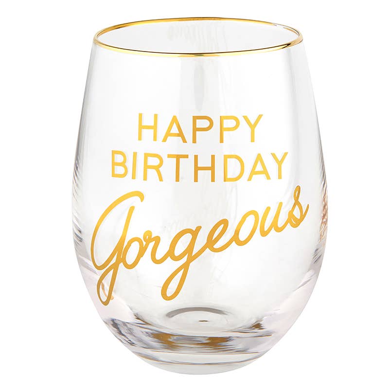Clear wine glass with gold rim and &