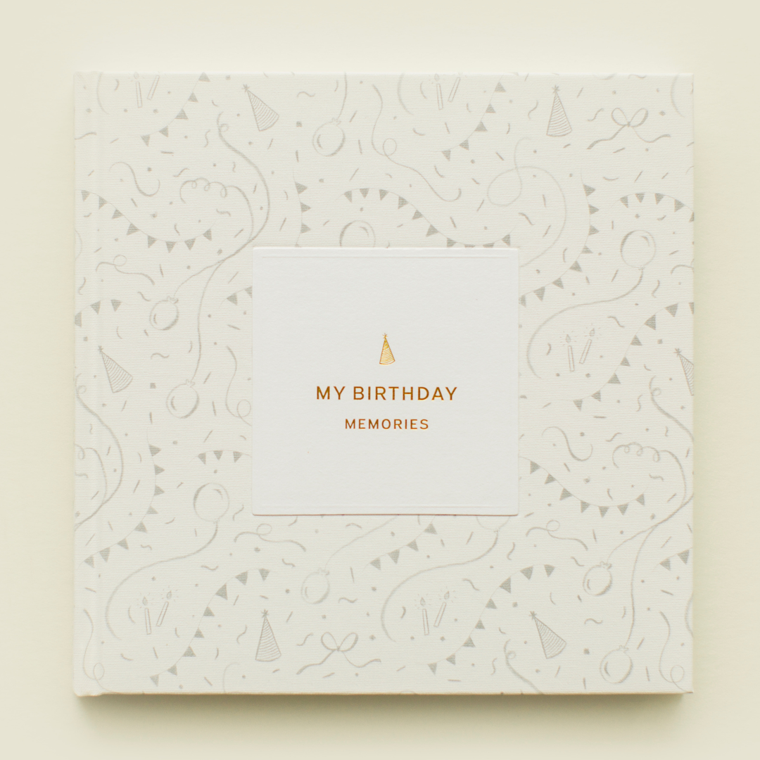 White book with gold text &