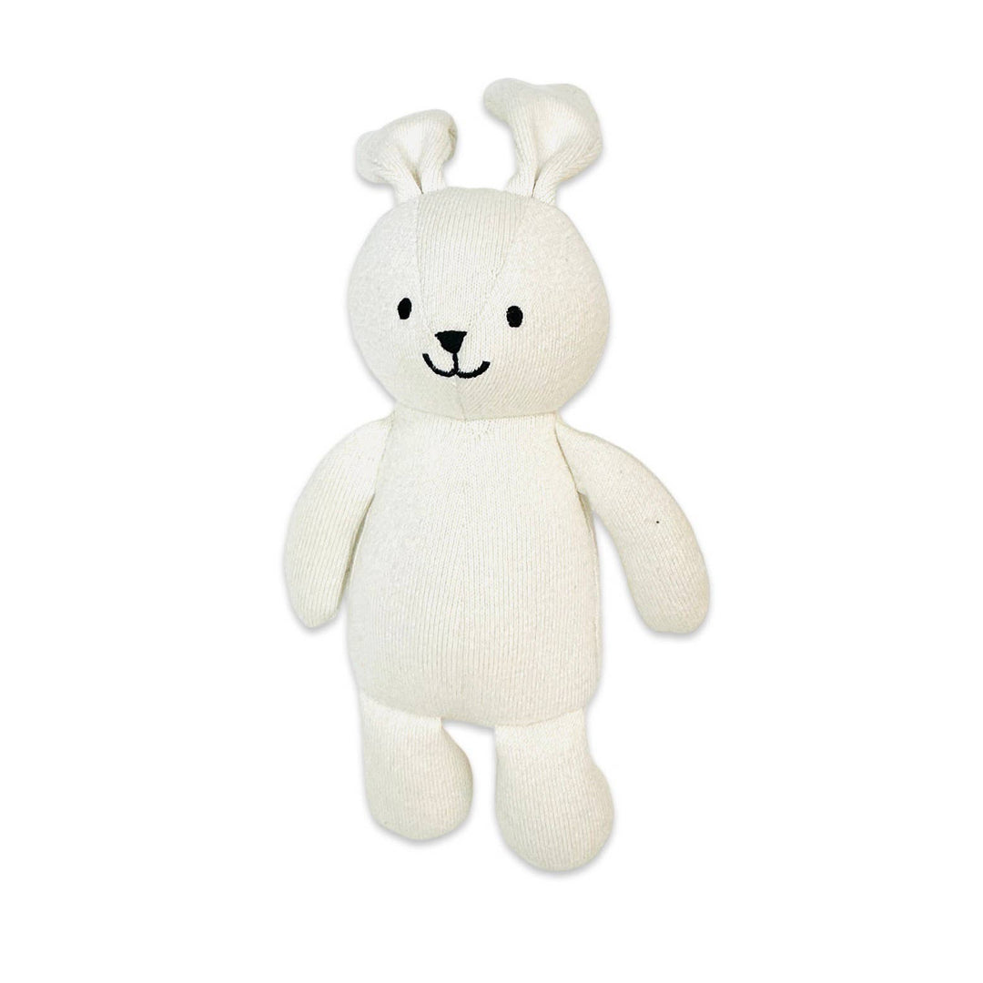 White plush toy with bunny ears on a white background