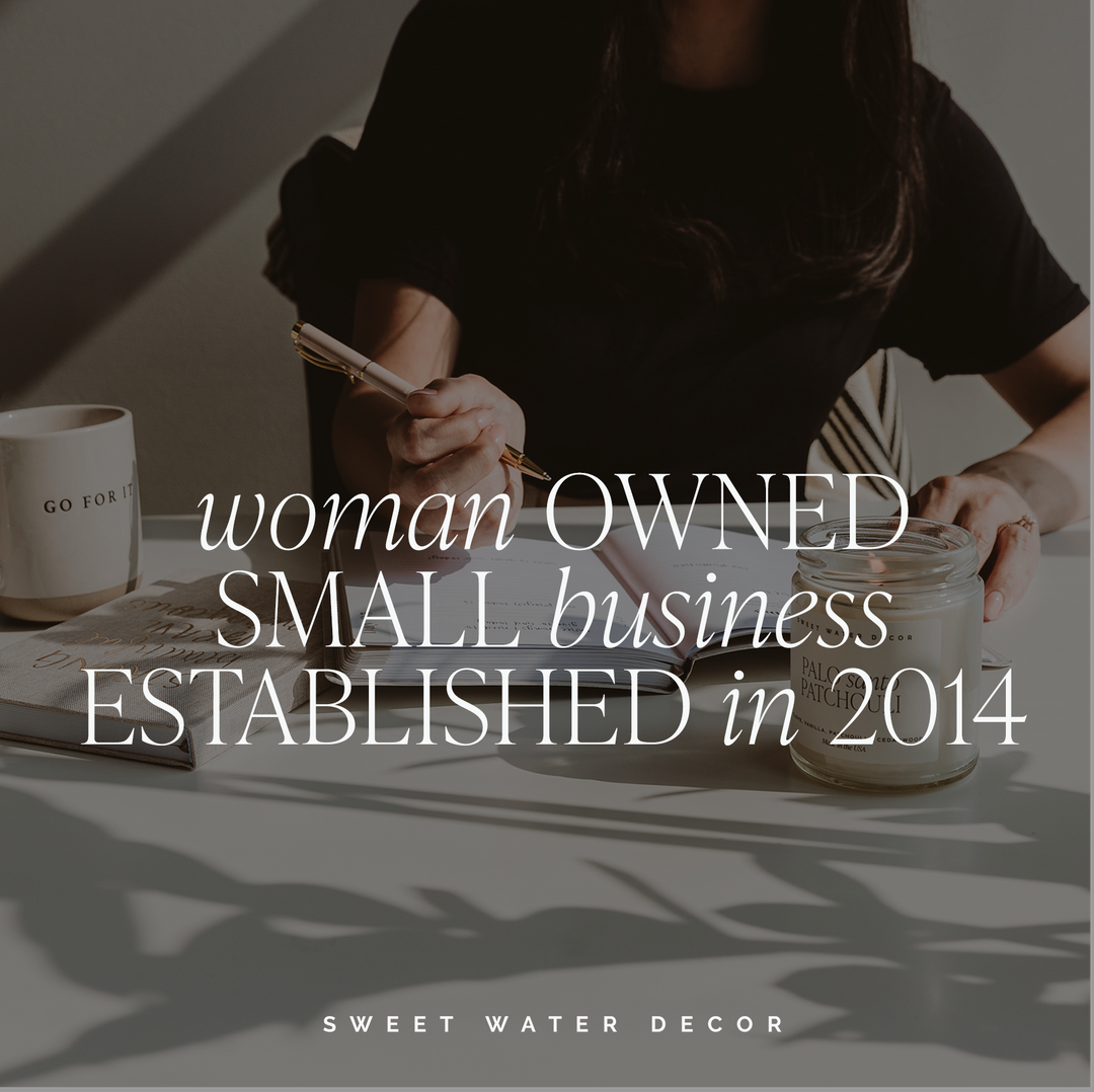 Person working at a table with text overlay about a woman-owned small business.