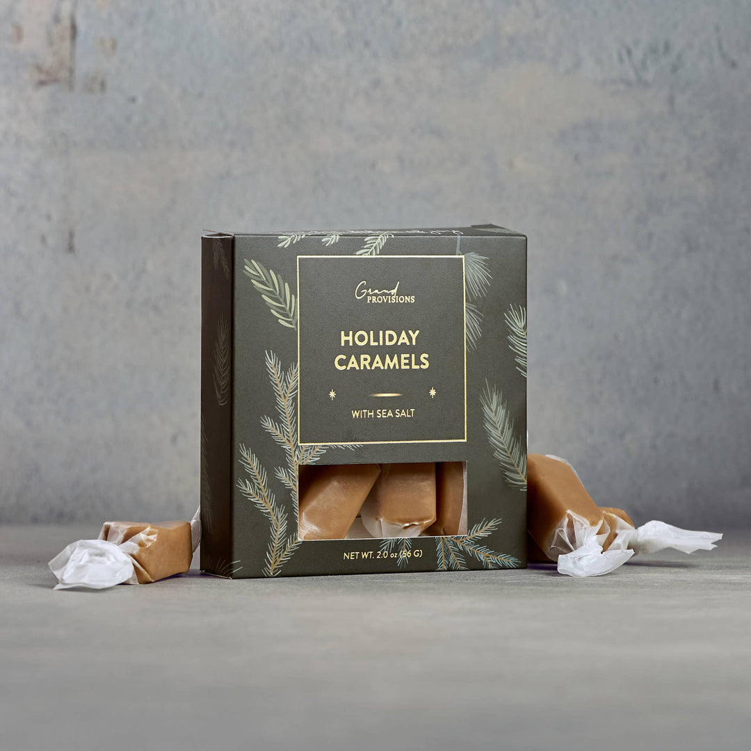 Box of Grand Provisions Holiday Caramels with Sea Salt on a gray background