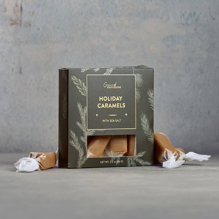 Box of Grand Provisions Holiday Caramels with Sea Salt on a gray background