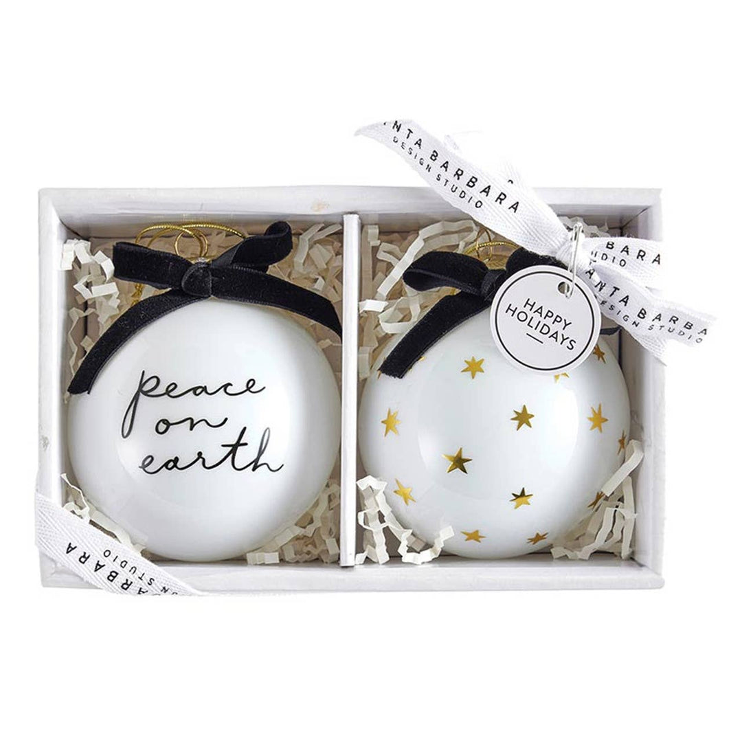Two decorative ornaments with &
