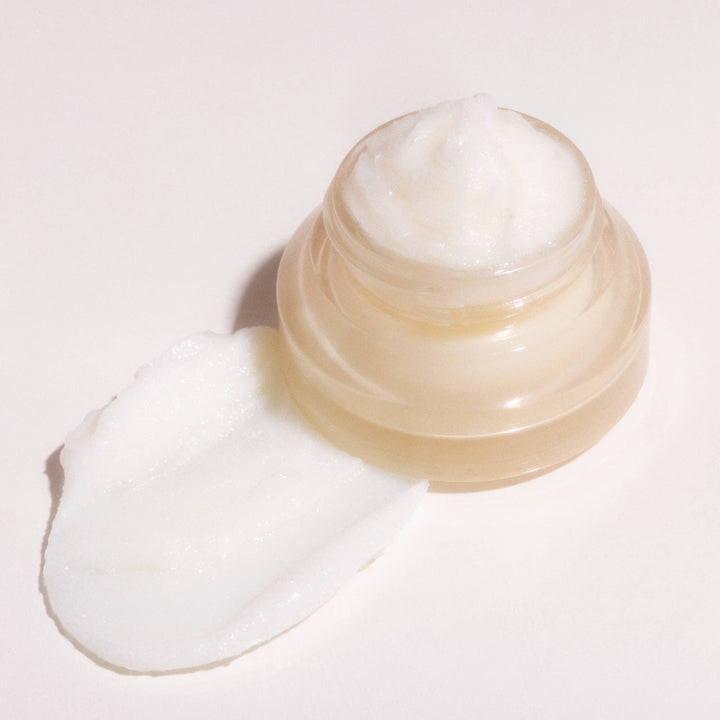 Small container of lip mask on a white background