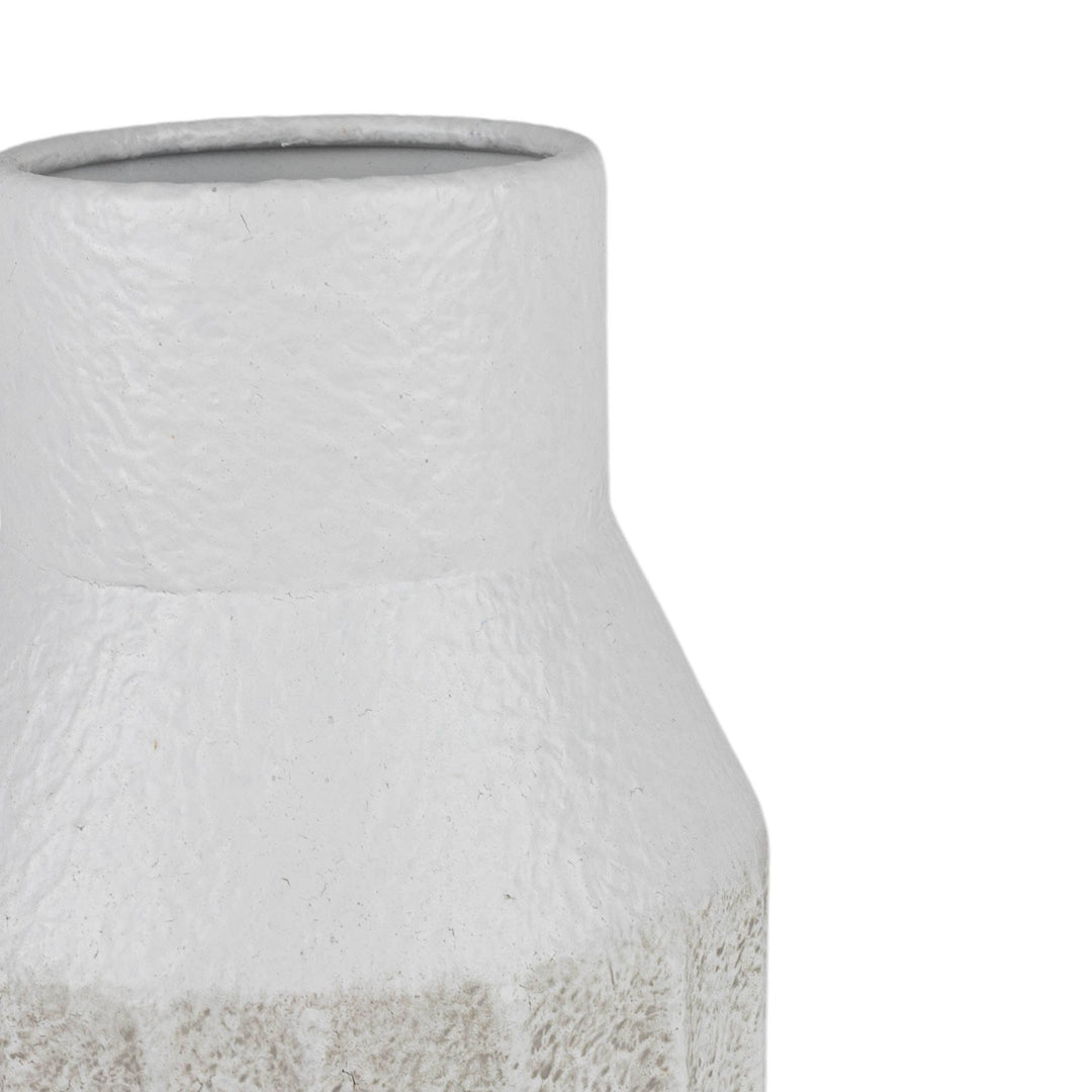 Textured ceramic vase on a white background