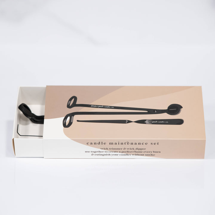 This candle maintenance set contains:       - 1 black wick trimmer, for keeping candle wicks cut short; promoting safety, prolonging the life of candles &amp; greatly reducing smoke during burning       - 1 black wick dipper for extinguishing candles with no smoke