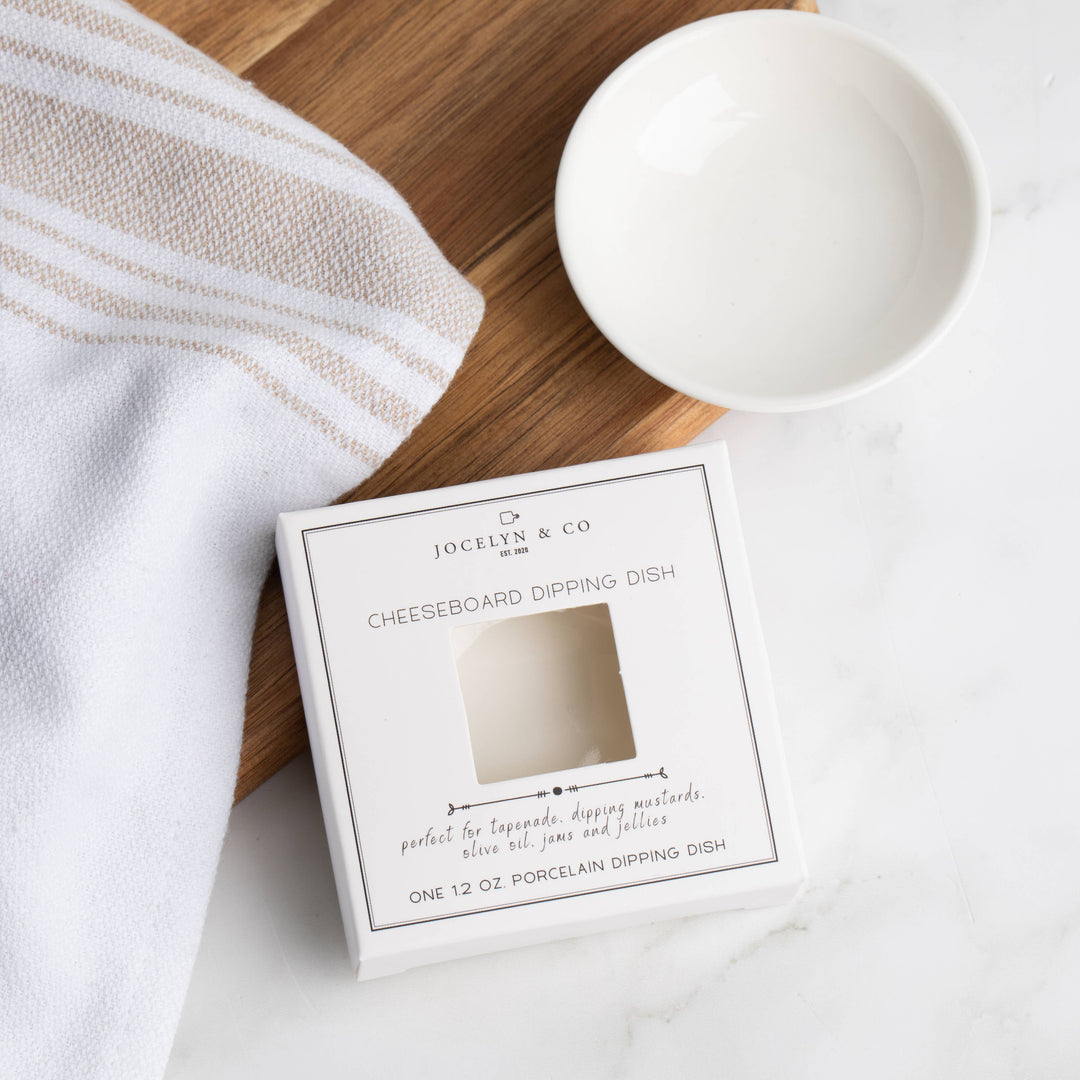 This mini dipping dish is a petite porcelain white dish perfect for tapenades, mustards, jams, or olive oil & Tuscan dipping spices. Set it on a charcuterie board with our crackers, cheese and sausage and enjoy your night!  • Versatile porcelain dish • Pairs well with olive oil & bread • Pairs well with Olive Tapenade or Sevillano Olives • Diameter of dish is just under 3 inches
