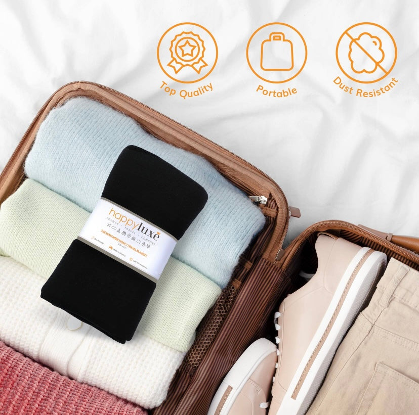 The Wayfarer travel wrap in classic jet black is a fashionable and versatile wrap and travel blanket, also can be used as a scarf, cover-up, pashmina, and so much more. This wrap is made from luxurious eco-friendly Tencel fiber material, a plant-based textile and cellulose fiber that is made from sustainably harvested beech trees, is absorbent and breathable, and is resistant to fading, pilling, and wear. This amazing fabric is machine washable. 68 x 35 inches. Made in the U.S.A.