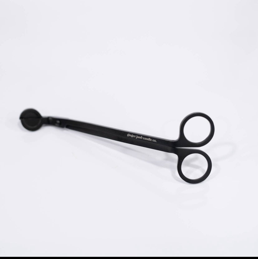 This candle maintenance set contains:       - 1 black wick trimmer, for keeping candle wicks cut short; promoting safety, prolonging the life of candles &amp; greatly reducing smoke during burning       - 1 black wick dipper for extinguishing candles with no smoke
