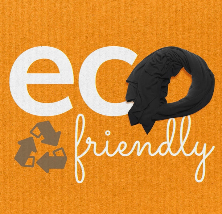 The Wayfarer travel wrap in classic jet black is a fashionable and versatile wrap and travel blanket, also can be used as a scarf, cover-up, pashmina, and so much more. This wrap is made from luxurious eco-friendly Tencel fiber material, a plant-based textile and cellulose fiber that is made from sustainably harvested beech trees, is absorbent and breathable, and is resistant to fading, pilling, and wear. This amazing fabric is machine washable. 68 x 35 inches. Made in the U.S.A.