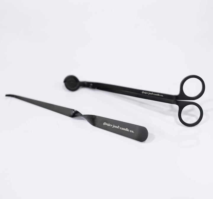 This candle maintenance set contains:       - 1 black wick trimmer, for keeping candle wicks cut short; promoting safety, prolonging the life of candles &amp; greatly reducing smoke during burning       - 1 black wick dipper for extinguishing candles with no smoke